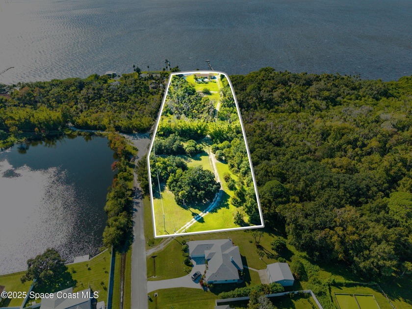 An extraordinary opportunity to own a rare 4+ acre riverfront - Beach Acreage for sale in Merritt Island, Florida on Beachhouse.com