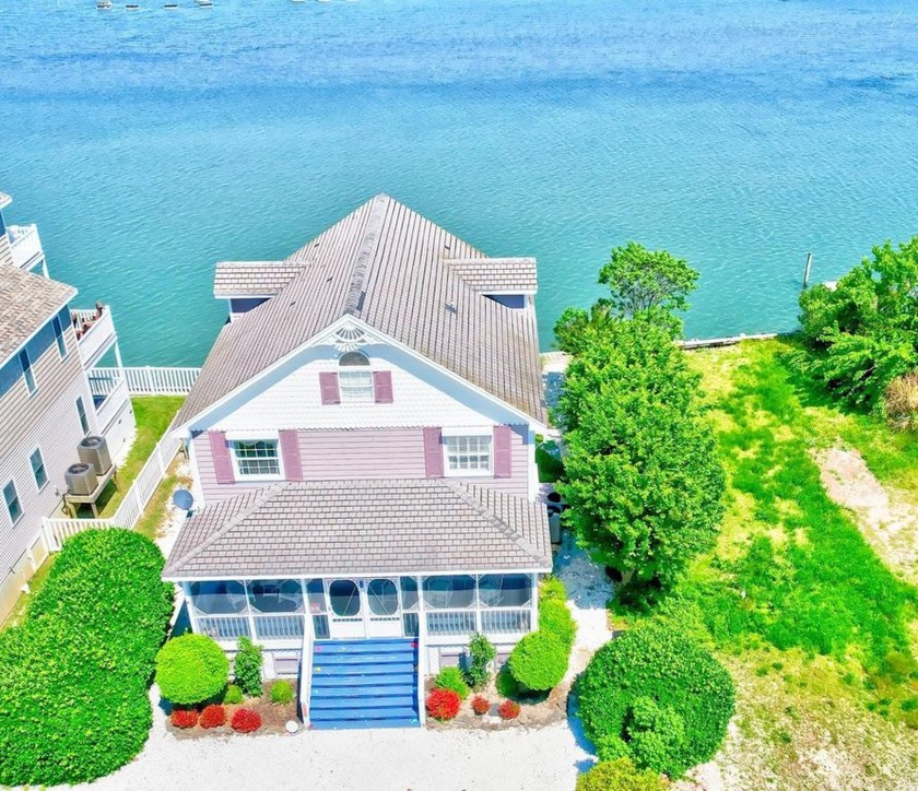 Coastal Waterfront Home with PANORAMIC & Sunset Views! This - Beach Home for sale in Chincoteague Island, Virginia on Beachhouse.com
