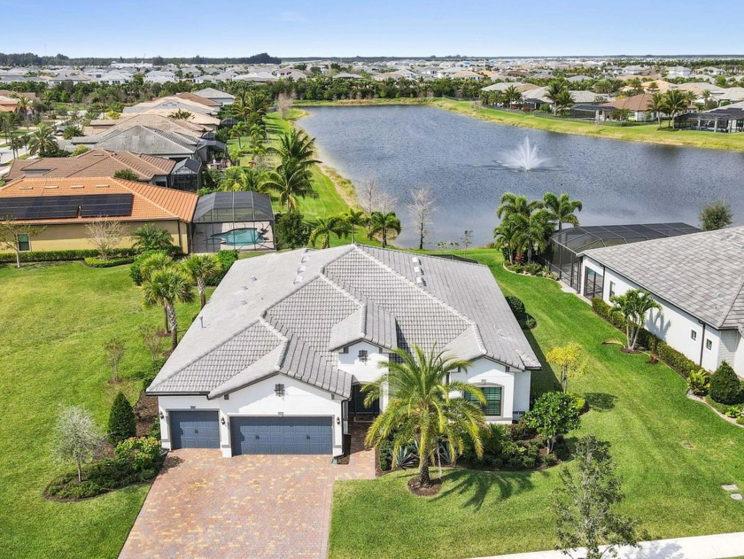 Experience unparalleled elegance in this stunning 2021-built - Beach Home for sale in Palm Beach Gardens, Florida on Beachhouse.com