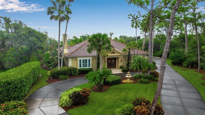 A grand traditional residence, this 3-bedroom, 3.5-bath home is - Beach Home for sale in Osprey, Florida on Beachhouse.com