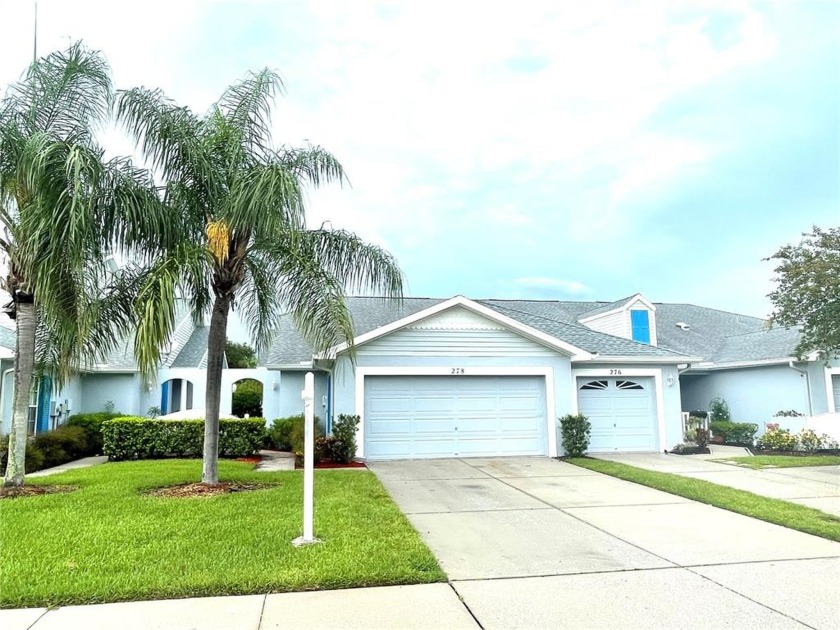 Rarely available Oldsmar END UNIT, POND-FRONT, GROUND-FLOOR - Beach Home for sale in Oldsmar, Florida on Beachhouse.com