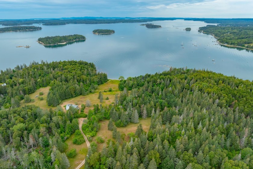 Set on 29.3 acres along Eggemoggin Reach, this rare Brooklin - Beach Home for sale in Brooklin, Maine on Beachhouse.com