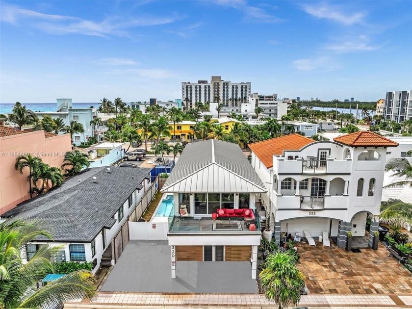 This stunning, fully furnished two-story home is the only - Beach Home for sale in Hollywood, Florida on Beachhouse.com