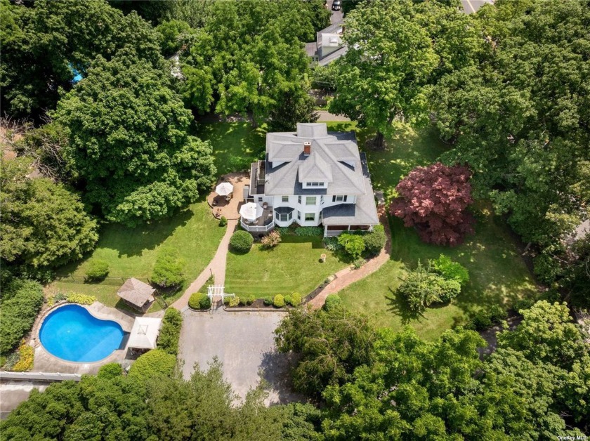 Welcome to this timeless 1900's colonial nestled back on nearly - Beach Home for sale in Miller Place, New York on Beachhouse.com