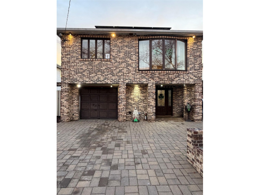 Discover this High Ranch located in the highly desirable - Beach Home for sale in Howard Beach, New York on Beachhouse.com