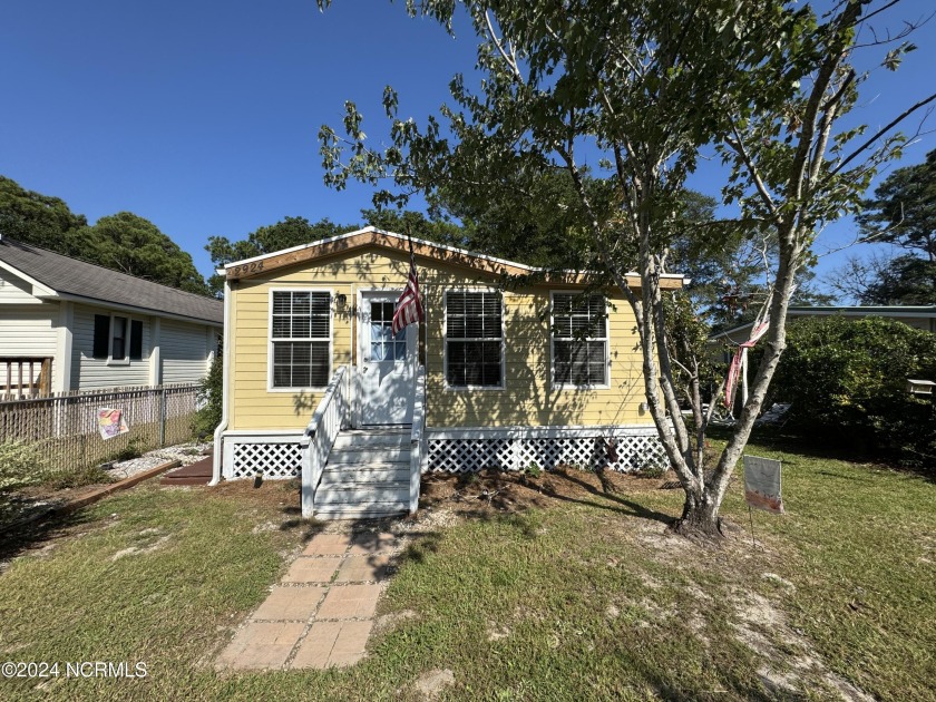 Located just 2 miles from beach access, this charming singlewide - Beach Home for sale in Supply, North Carolina on Beachhouse.com