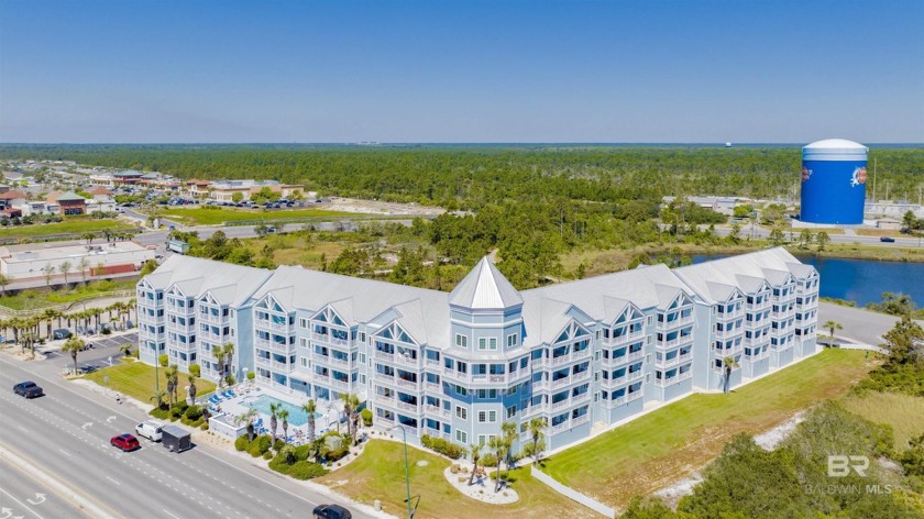 White sand and a beer in your hand.  Welcome to your blissful - Beach Home for sale in Orange Beach, Alabama on Beachhouse.com