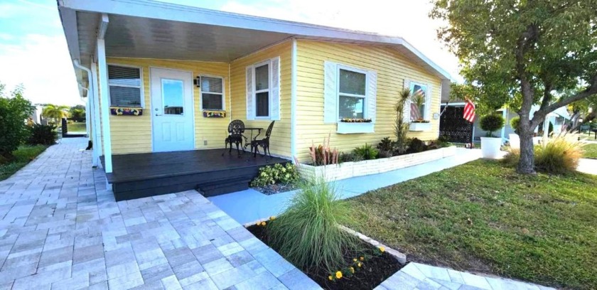 Step into your dream oasis, ON A POND,with this gorgeous remodel - Beach Home for sale in Sarasota, Florida on Beachhouse.com