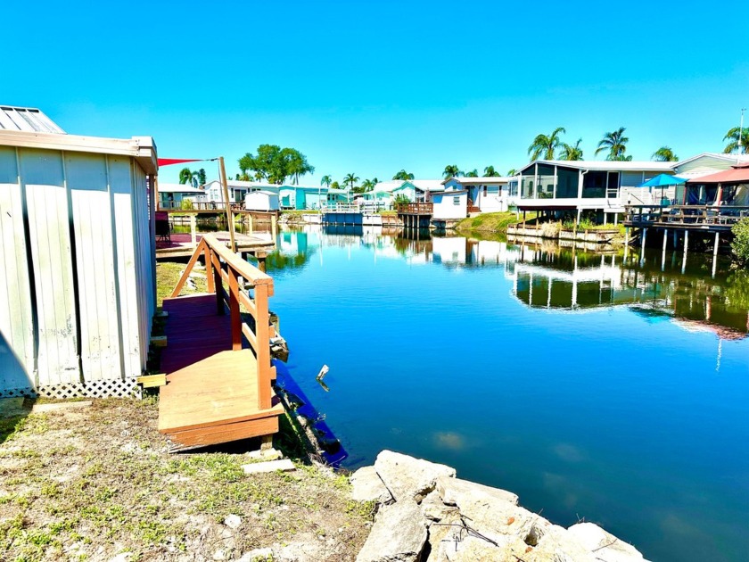 WATERFRONT/1B1BA/$575MO LOT RENT/HAWAIIAN ISLES - Beach Home for sale in Ruskin, Florida on Beachhouse.com