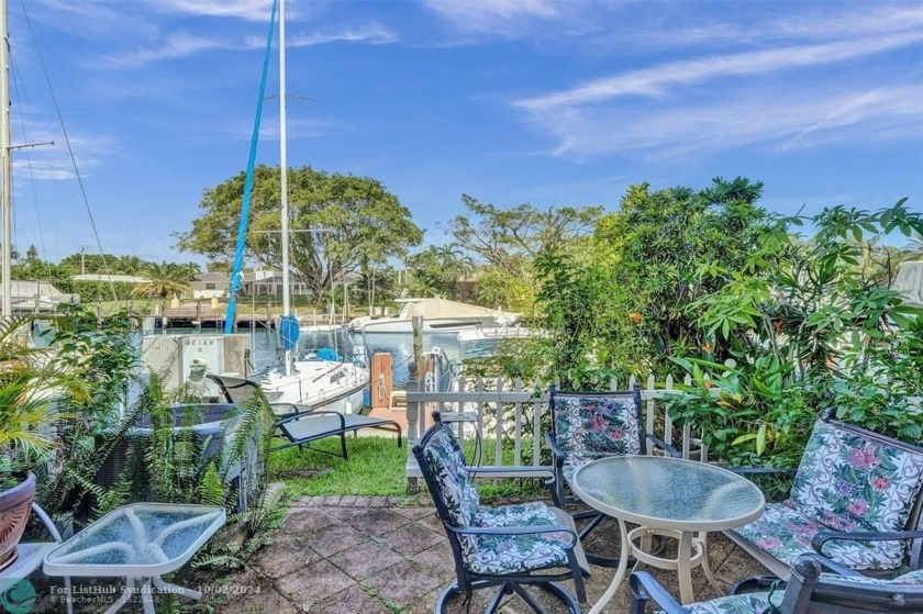 Relax on your patio enjoying the beautiful water view while - Beach Townhome/Townhouse for sale in Pompano Beach, Florida on Beachhouse.com