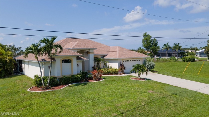 This beautiful single-family pool home is nestled in the highly - Beach Home for sale in Cape Coral, Florida on Beachhouse.com