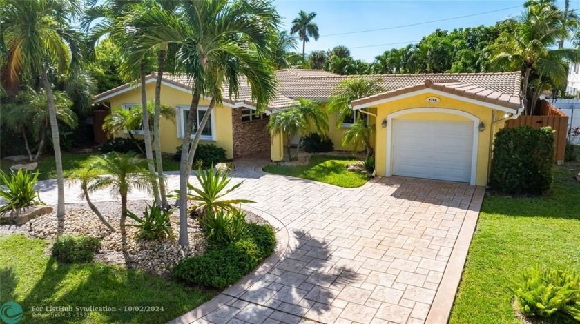 Step into a world of comfort in this 4 bedroom, 3 (updated) - Beach Home for sale in Lighthouse Point, Florida on Beachhouse.com