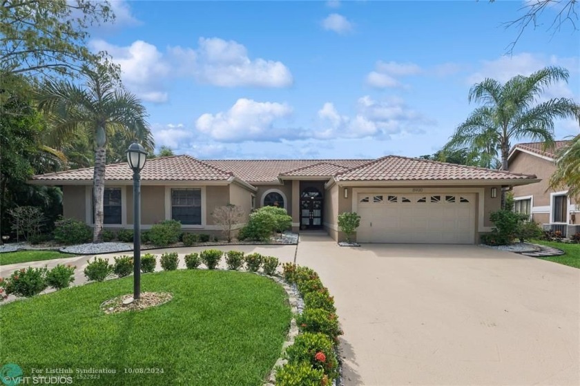 SPECTACULAR 5 BEDROOM-3 BATH POOL HOME ON BEAUTIFUL PEACEFUL - Beach Home for sale in Coral Springs, Florida on Beachhouse.com