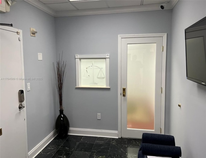 This exclusive office suite boasts 9 private offices, a lobby - Beach Commercial for sale in Hollywood, Florida on Beachhouse.com