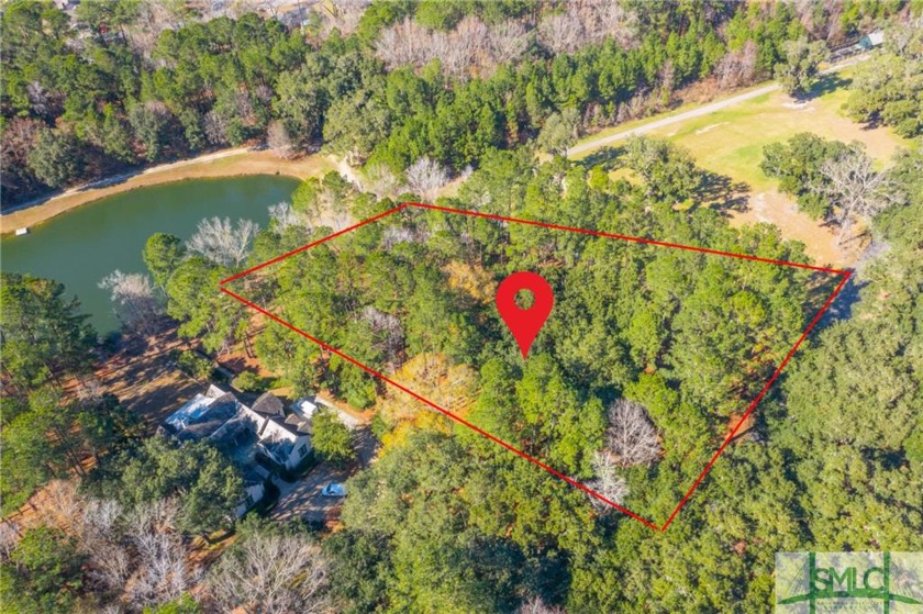 Private wooded lot situated across from a picturesque oak allee - Beach Lot for sale in Richmond Hill, Georgia on Beachhouse.com