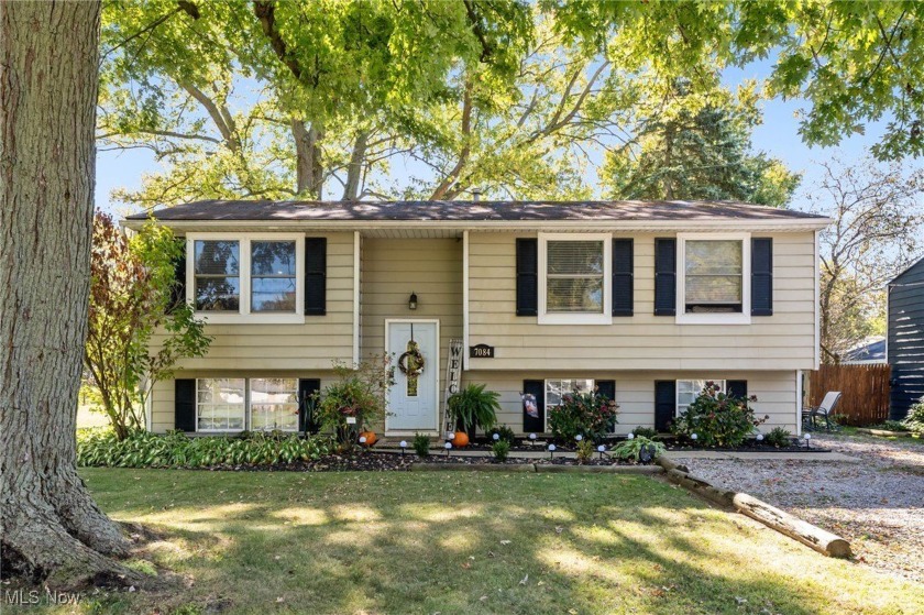 Welcome to this beautifully renovated 4-bedroom, 2-bath bi-level - Beach Home for sale in Madison, Ohio on Beachhouse.com