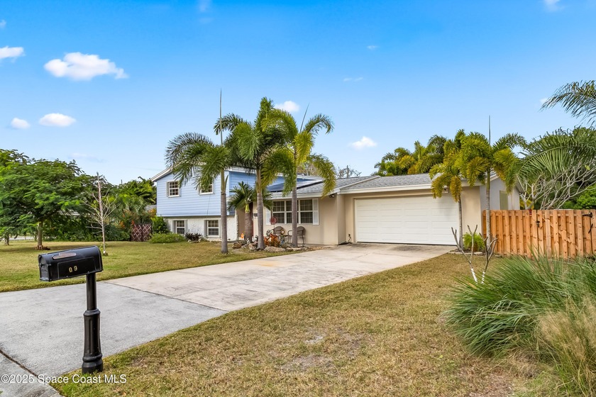 Split-level home with scenic backdrop overlooking Elbow Creek - Beach Home for sale in Melbourne, Florida on Beachhouse.com