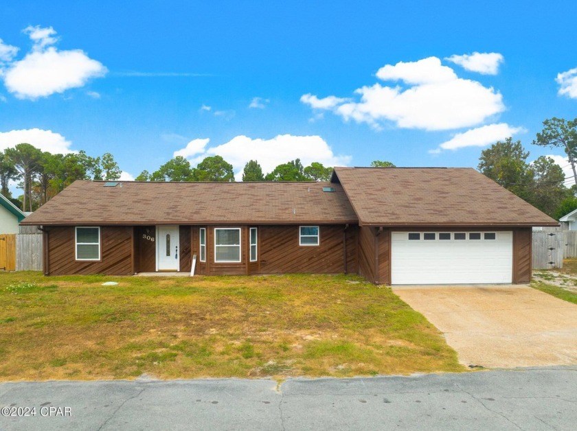 This charming 3-bedroom, 2-bathroom residence is situated in the - Beach Home for sale in Panama City, Florida on Beachhouse.com