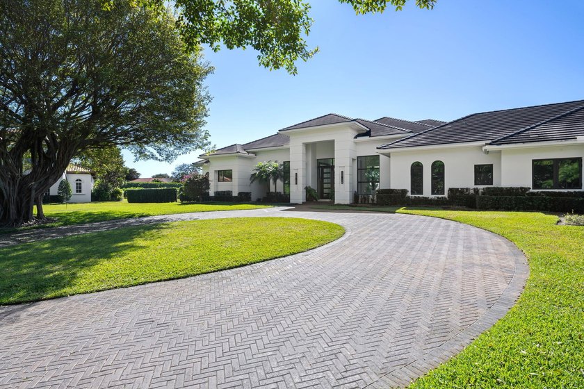 Set on a quiet cul-de-sac within the prestigious enclave of Long - Beach Home for sale in Boca Raton, Florida on Beachhouse.com