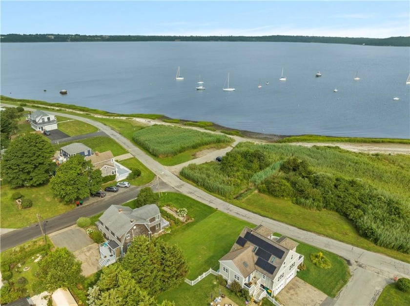 Discover the perfect canvas for your dream home in the coveted - Beach Lot for sale in Portsmouth, Rhode Island on Beachhouse.com