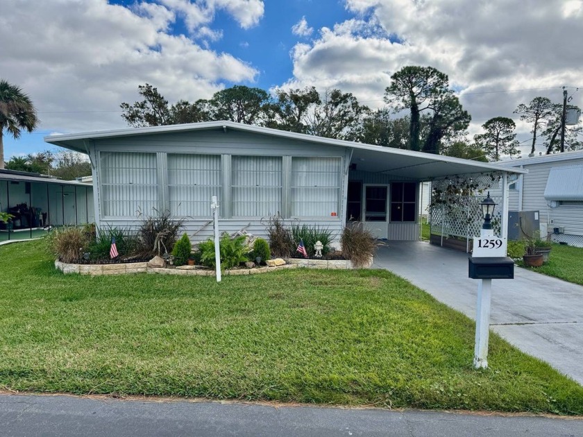 This 2 bed/2bath has a large screened/windowed porch with shed - Beach Home for sale in Daytona Beach, Florida on Beachhouse.com