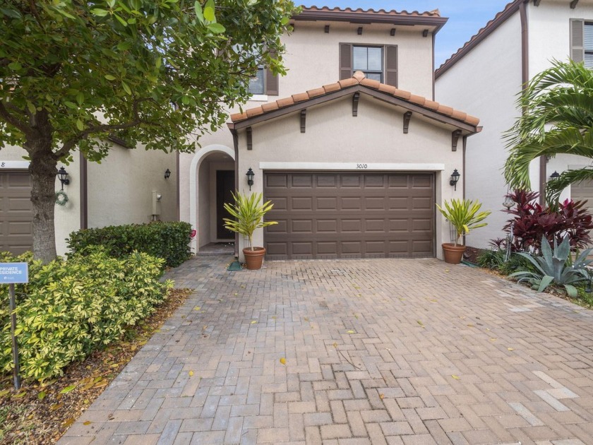 Highly desirable Gated community nestled in a serene cul-de-sac - Beach Home for sale in Riviera Beach, Florida on Beachhouse.com