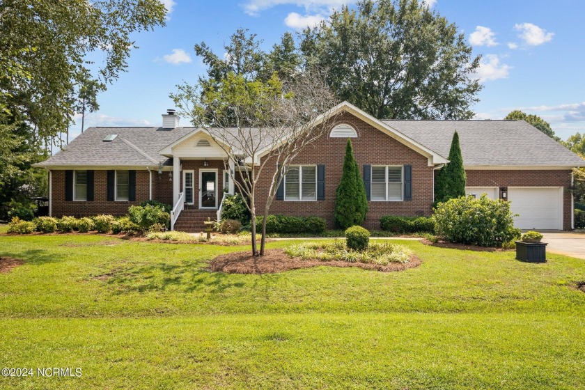 Discover this beautifully updated 3-bedroom brick home nestled - Beach Home for sale in New Bern, North Carolina on Beachhouse.com