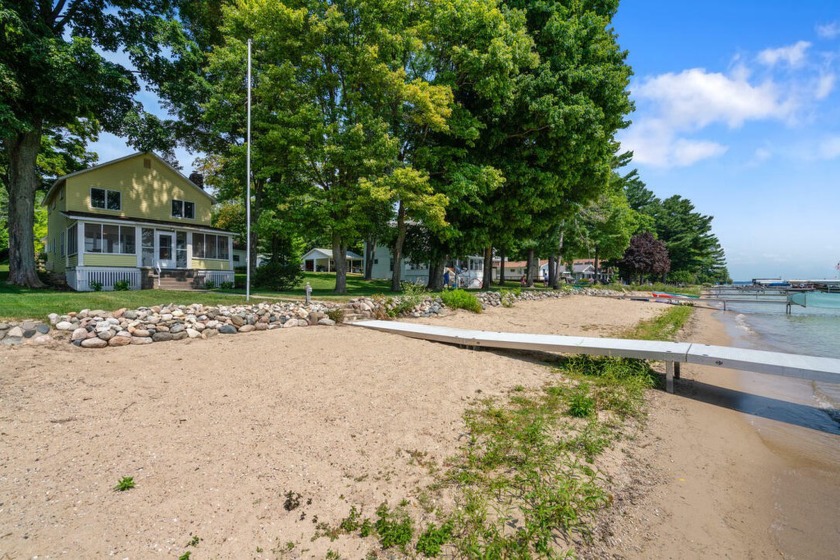 ''Toes in the Sand'' perfectly captures the essence of a summer - Beach Home for sale in Cheboygan, Michigan on Beachhouse.com