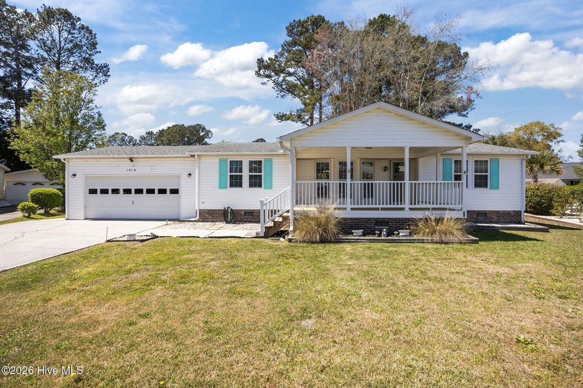 This beautifully maintained home offers two masters, both with - Beach Home for sale in Carolina Shores, North Carolina on Beachhouse.com