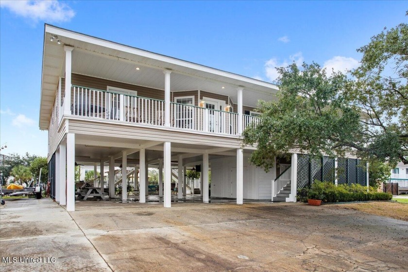 This remarkable home offers an array of premium features and - Beach Home for sale in Pass Christian, Mississippi on Beachhouse.com