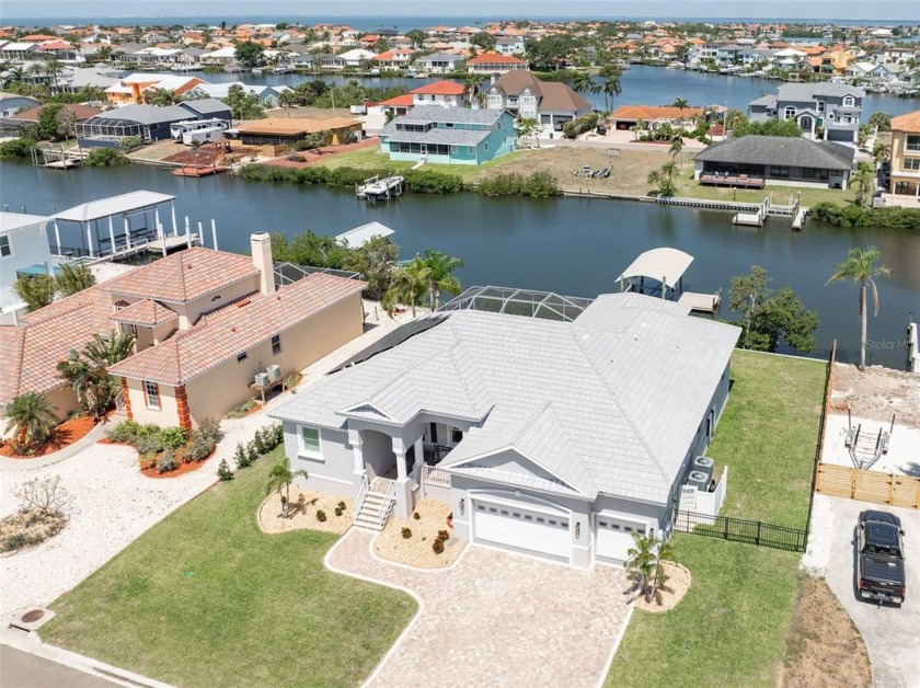 Welcome to this well-maintained, energy-efficient waterfront - Beach Home for sale in Apollo Beach, Florida on Beachhouse.com