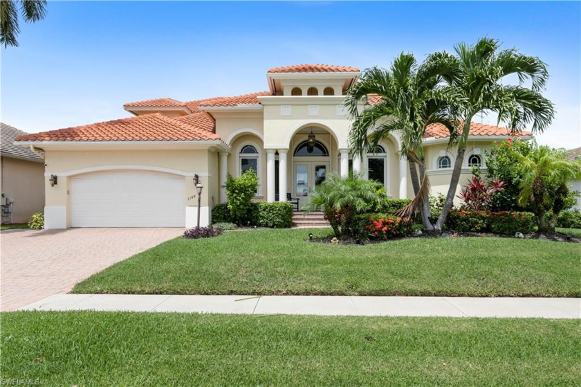 This stunning 3 bedroom plus den 3.5 bath Marco Island home is - Beach Home for sale in Marco Island, Florida on Beachhouse.com