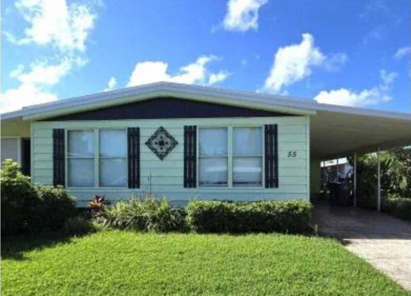 Step into the sun-soaked charm of this stunning 2 bed, 2 bath - Beach Home for sale in Bradenton, Florida on Beachhouse.com