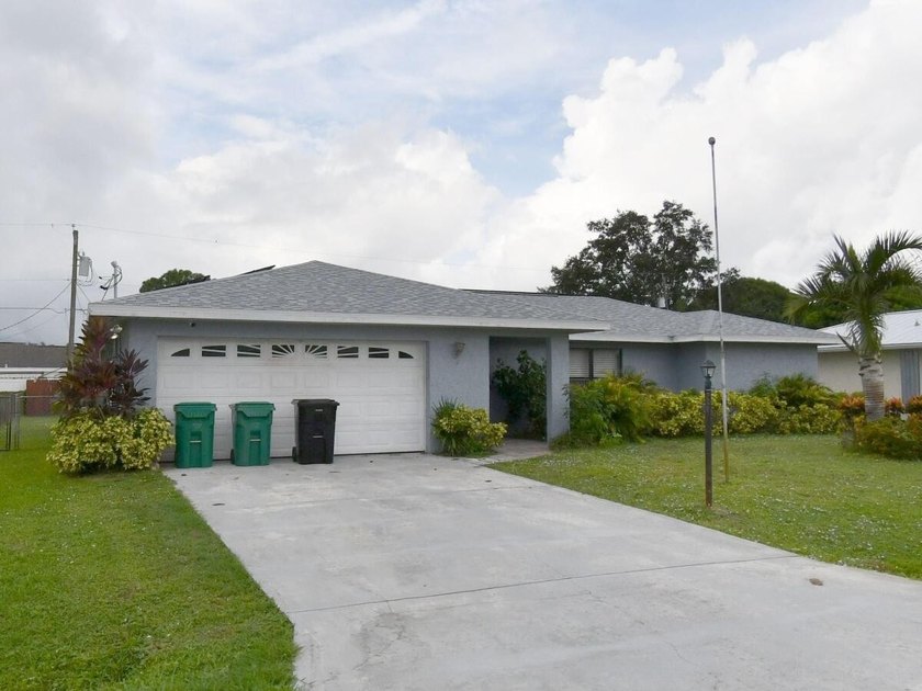 This CBS Pool Home has it All !Centrally located with easy - Beach Home for sale in Port Saint Lucie, Florida on Beachhouse.com