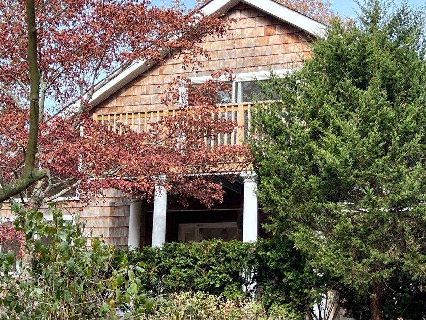 Discover this inviting four-bedroom, two and a half bath home - Beach Home for sale in Hampton Bays, New York on Beachhouse.com