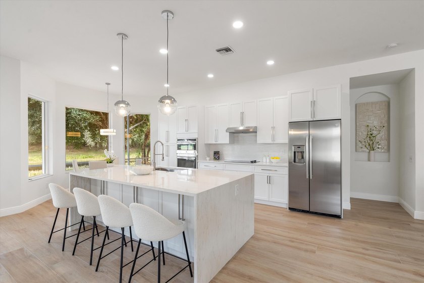 RARELY AVAILABLE water lot home, guard gates and FULLY RENOVATED - Beach Home for sale in Boynton Beach, Florida on Beachhouse.com