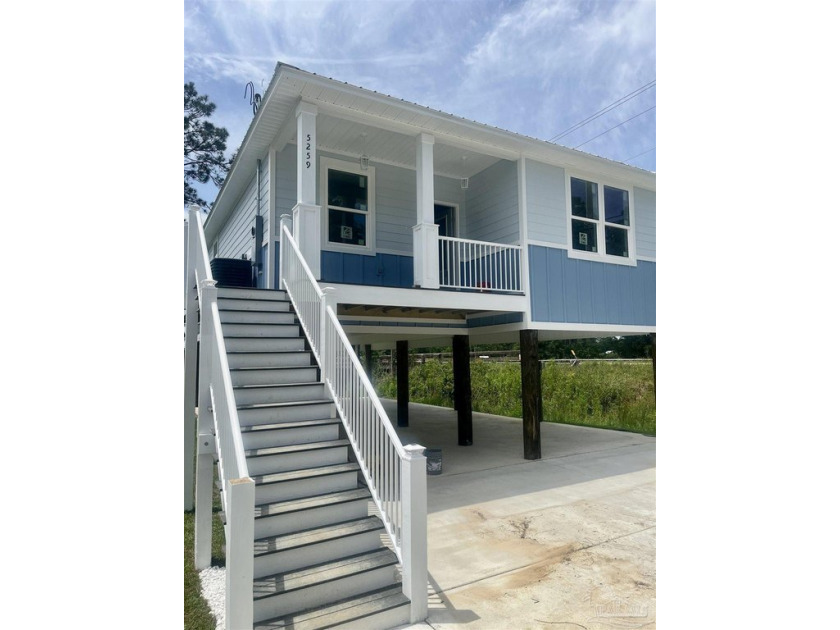 Experience the charm of waterfront living in this beautifully - Beach Home for sale in Milton, Florida on Beachhouse.com