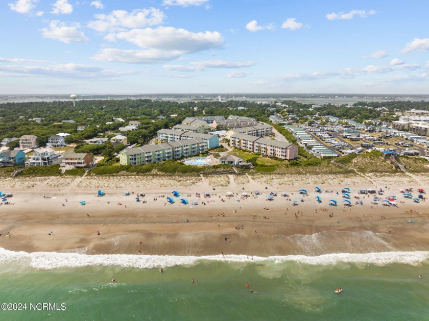 Stunning three bedroom OCEANFRONT condo in the desirable Pebble - Beach Condo for sale in Emerald Isle, North Carolina on Beachhouse.com