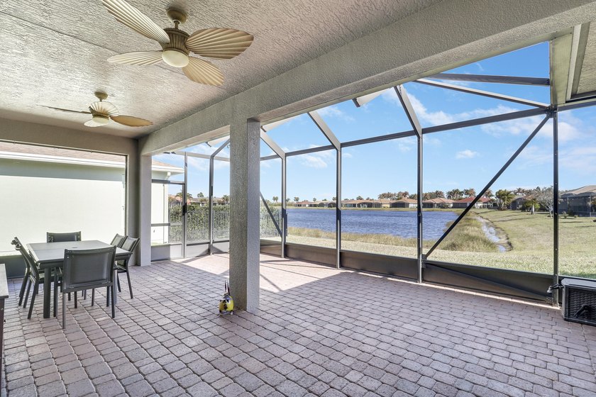 Wake up to gorgeous lake views in this 2BR+Den/2BA/2CG Jensen - Beach Home for sale in Port Saint Lucie, Florida on Beachhouse.com