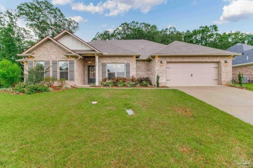 Natural beauty abounds in this beautiful craftsman style home in - Beach Home for sale in Pace, Florida on Beachhouse.com