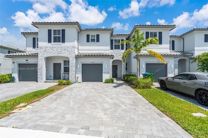 Exceptional Opportunity! Discover this modern home featuring an - Beach Townhome/Townhouse for sale in Coral Springs, Florida on Beachhouse.com