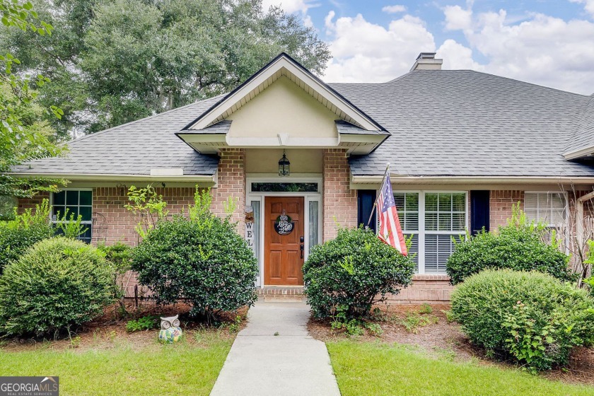 Golf Anyone? This beautiful 4-bedroom, 2-bath all-brick home is - Beach Home for sale in Savannah, Georgia on Beachhouse.com