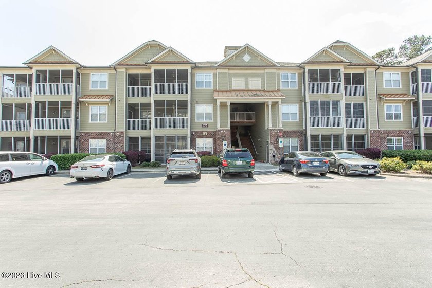 Embrace the best of coastal living in this exceptional 3-bedroom - Beach Condo for sale in Calabash, North Carolina on Beachhouse.com