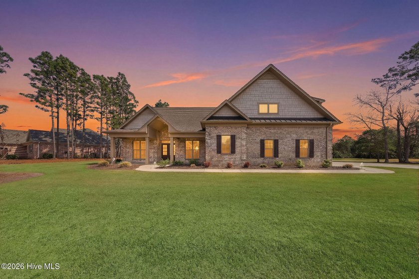 This stunning 2024 home is situated on a rare .54-acre homesite - Beach Home for sale in Leland, North Carolina on Beachhouse.com