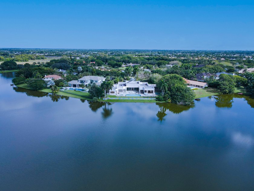Lakefront tennis estate on 1.25 acres in Boca Raton's - Beach Home for sale in Boca Raton, Florida on Beachhouse.com