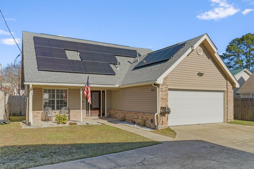 *Enjoy huge utility savings with paid off solar panels!* Located - Beach Home for sale in Fort Walton Beach, Florida on Beachhouse.com