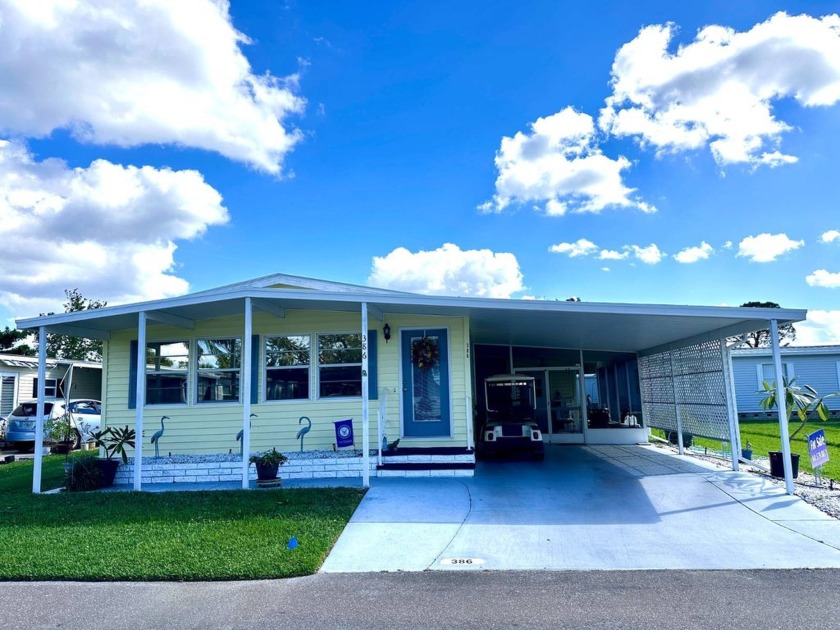 This charming home offers fantastic curb appeal with its - Beach Home for sale in Ellenton, Florida on Beachhouse.com