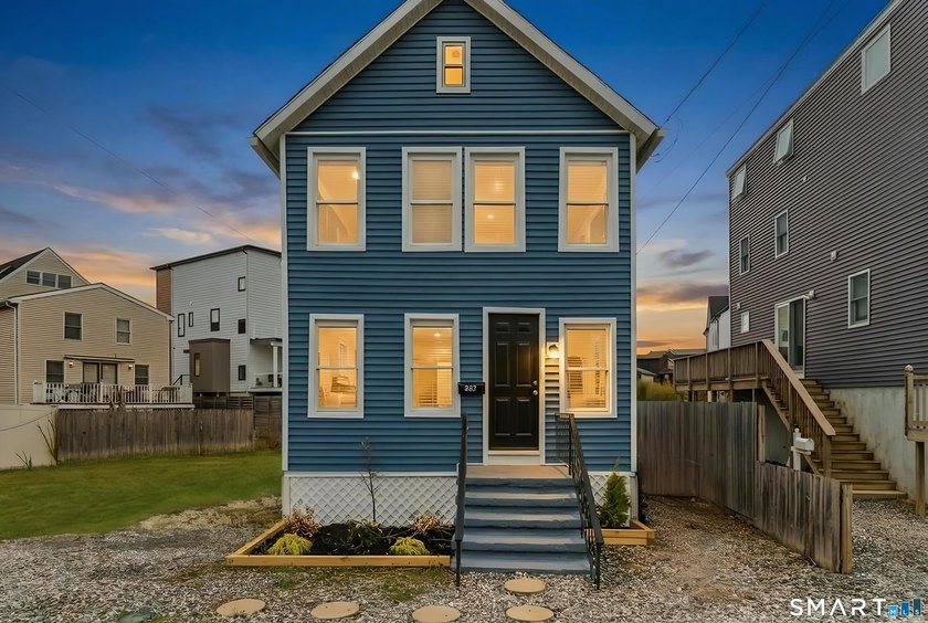 Wake up to coastal breezes and water views in this charming - Beach Home for sale in Milford, Connecticut on Beachhouse.com