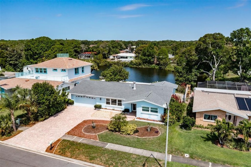 GORGEOUS UPDATED WATERFRONT POOL HOME in desirable Morningside - Beach Home for sale in Clearwater, Florida on Beachhouse.com