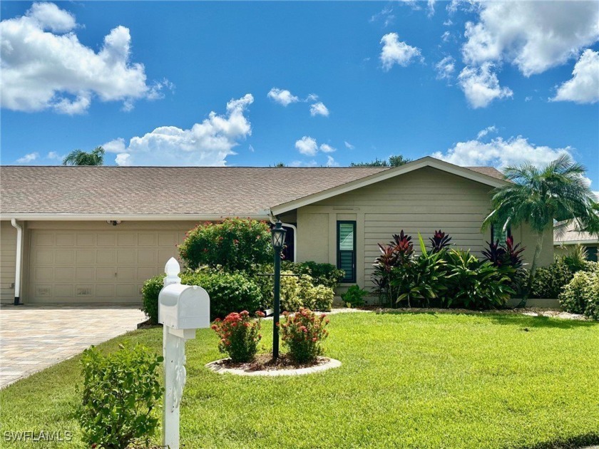 Not in a Flood Zone!  This move-in ready home is nestled at the - Beach Home for sale in Fort Myers, Florida on Beachhouse.com